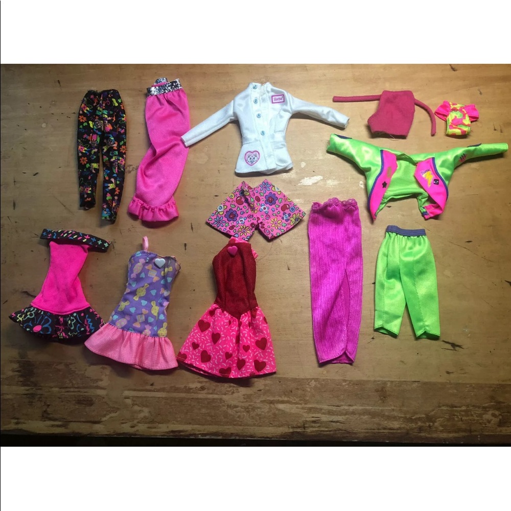 Vintage Lot of 12 PCs Bright Colors Barbie Clothes 
See photos for items